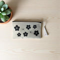 Neceser con diseño | flores blanco y negro - Caramel regalos